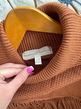 Chelsea & Theodore Burnt Orange Fringe Turtleneck Sweater